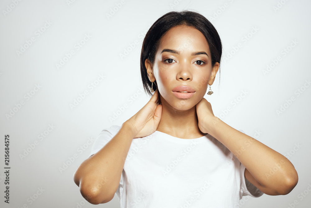African woman on a light background portrait African woman on a light background portrait