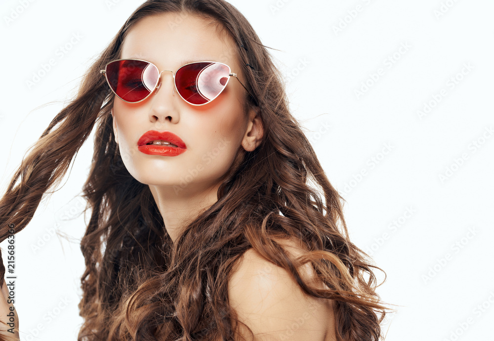 beautiful woman in glasses with curls portrait