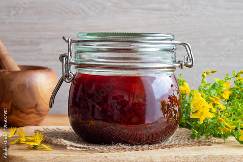 Preparation of St. John's wort oil from St. John's wort flowers photo