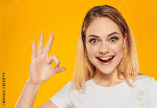 young woman with thumbs up