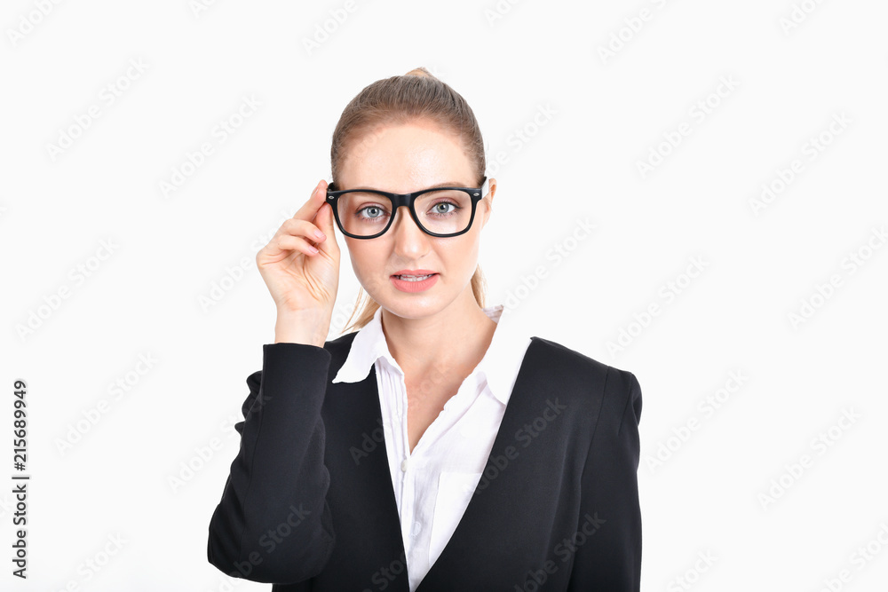 Business Concept. Beautiful businesswoman poses confidently. Beautiful young businesswoman looks charming and trustworthy. Young businesswoman has leadership on a white background. Business Concept. Beautiful businesswoman poses confidently. Beautiful young businesswoman looks charming and trustworthy. Young businesswoman has leadership on a white background.