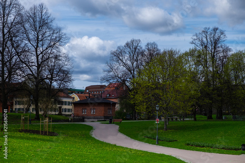 The path leading to the turbine house in the bachground through the Vasa park in Vasteras in Sweden 