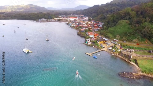 Natural harbor by the Caribbean Sea aerial drone view.  Porto Bello is a port city and corregimiento in Portobelo District in Panama. It has a deep natural harbor . photo