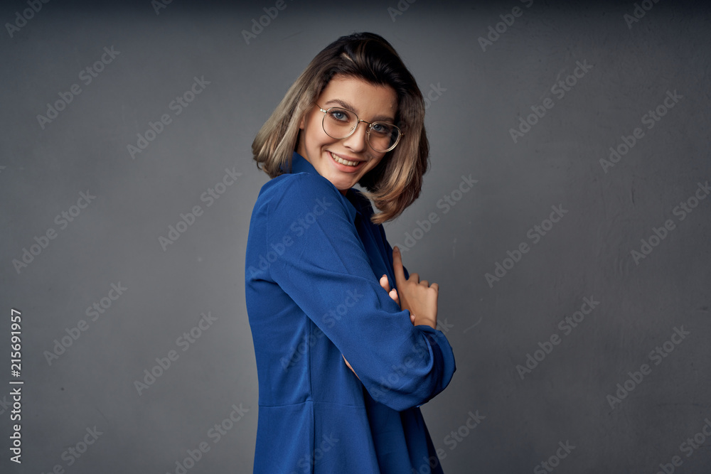 business woman with glasses smiling