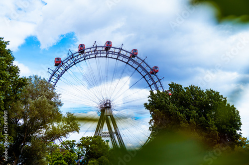 Ferris wheel in Praterin Vienna surrounded by greenery
