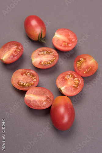 Cherry tomatoes on a colored background
