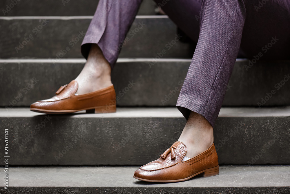 Hipster man wear fashion shoes tassel loafer.On old floor. Stylish men shoes  concept. Photos | Adobe Stock