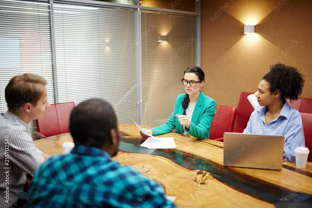 Group of business people having discussion in conference room Group of business people having discussion in conference room