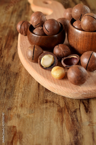 Macadamia nuts on a wooden board