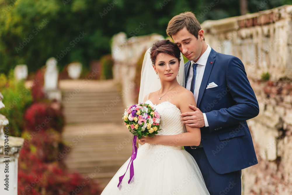 Wedding shoot of bride and groom in autumn park Wedding shoot of bride and groom in autumn park