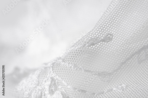White fabric clothing lace flowers dress wedding textile on blur background
