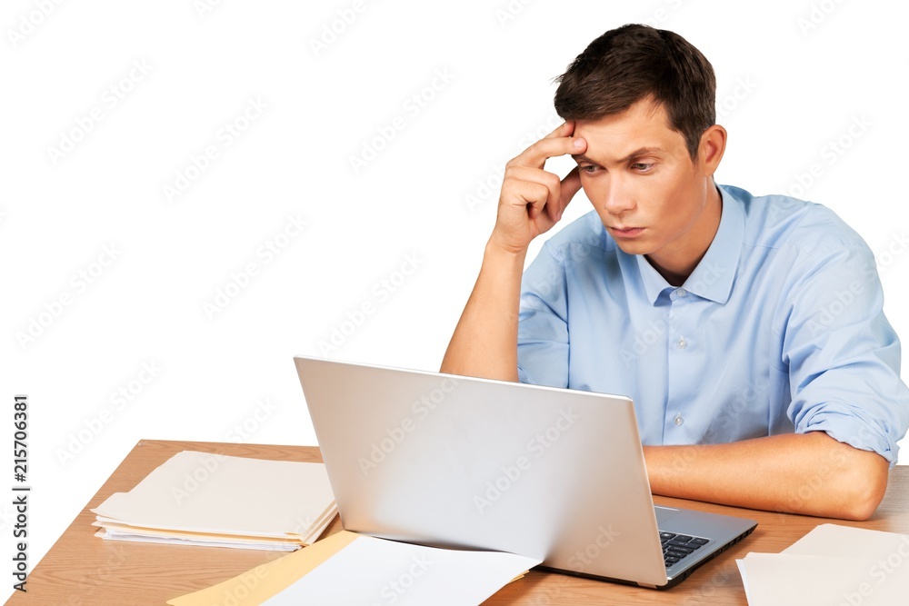 Portrait of young man using laptop isolated on white background Portrait of young man using laptop isolated on white background