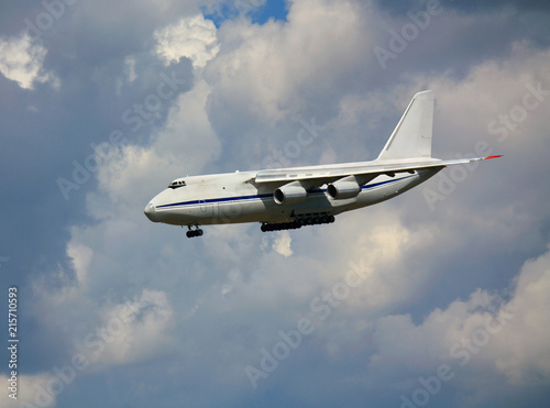 Transport airplane in the summer sky