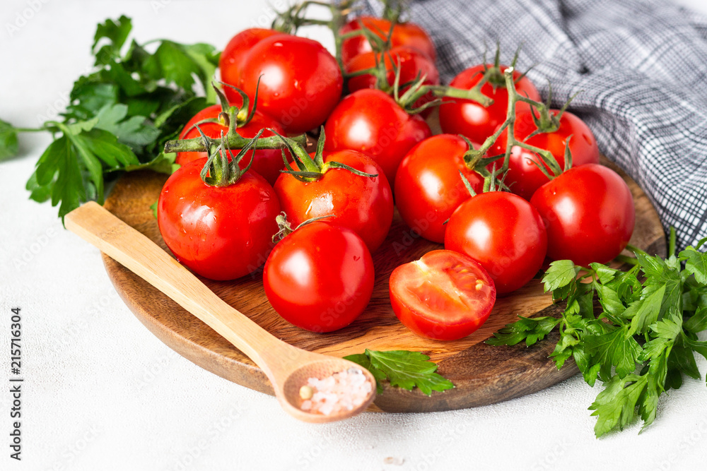 Cherry tomatoes with herbs (parsley), salt and pepper. Organic food. Ingredients for preparation tomato juice or soup (gazpacho).