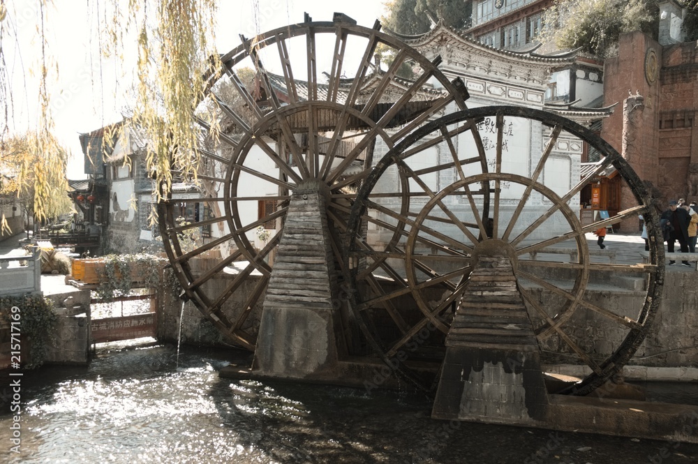 Old chinese water mill in the entrance of the Old Town of Lijiang (Yunnan, China)
