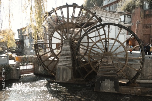 Old chinese water mill in the entrance of the Old Town of Lijiang (Yunnan, China)