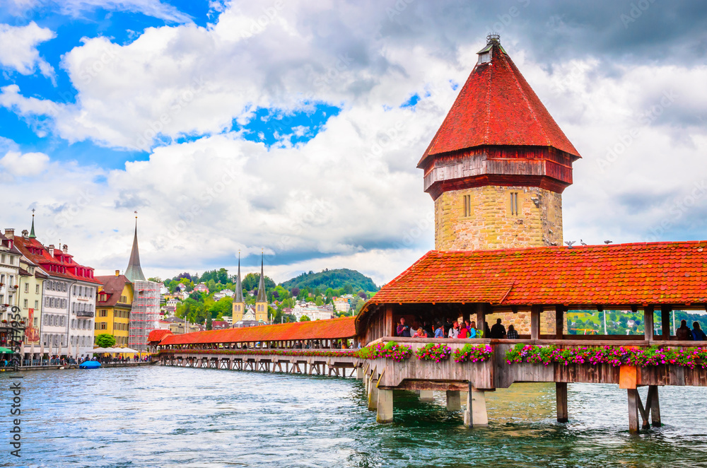 City center with famous Chapel Bridge and lake in Lucerne, Switzerland City center with famous Chapel Bridge and lake in Lucerne, Switzerland