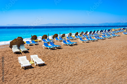 Sunbeds at Rhodes beach, Greece © saiko3p