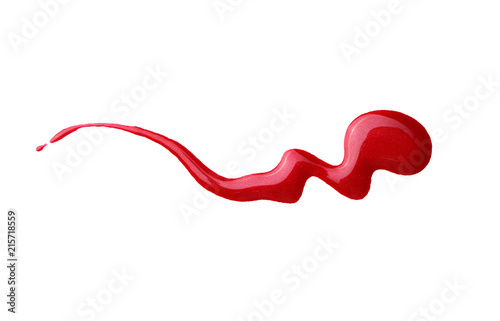 Фотография red nail polish or blood splash isolated on white background