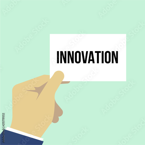 Man showing paper INNOVATION text 