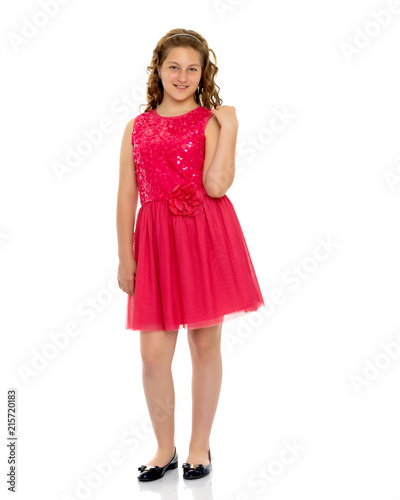 Elegant girl in a dress. © lotosfoto