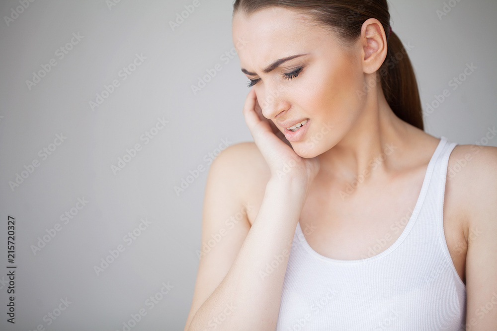 Tooth Pain. Woman Feeling Tooth Pain. Closeup Of Beautiful Sad Girl Suffering From Strong Tooth Pain. Attractive Female Feeling Painful Toothache. Dental Health And Care Concept Tooth Pain. Woman Feeling Tooth Pain. Closeup Of Beautiful Sad Girl Suffering From Strong Tooth Pain. Attractive Female Feeling Painful Toothache. Dental Health And Care Concept
