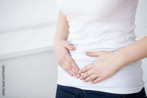 Stomachache. Woman Having Painful Stomachache, Female Suffering From Abdominal Pain