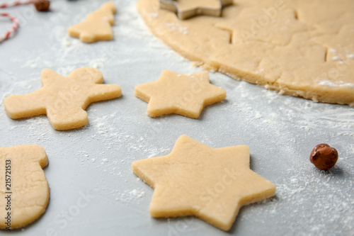 Raw Christmas cookies on table. Festive treats