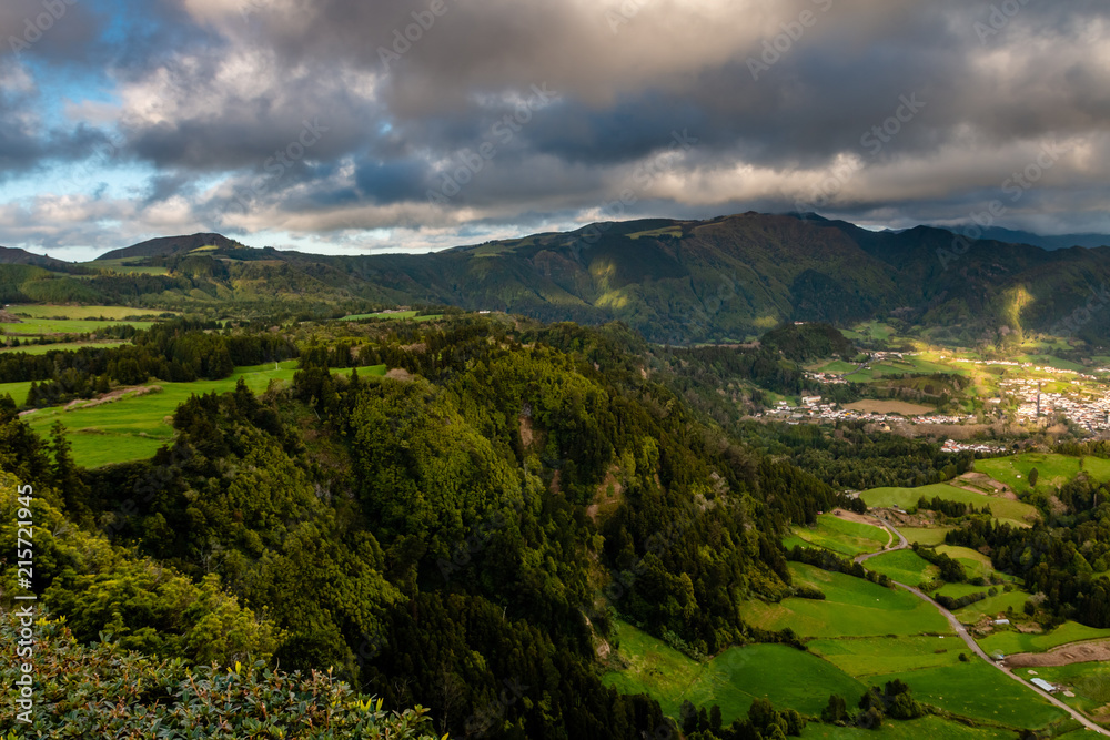 Aerial view on small village located near by volcanic lake - Furnas on Azores islands, Sao Miguel, Portugal
