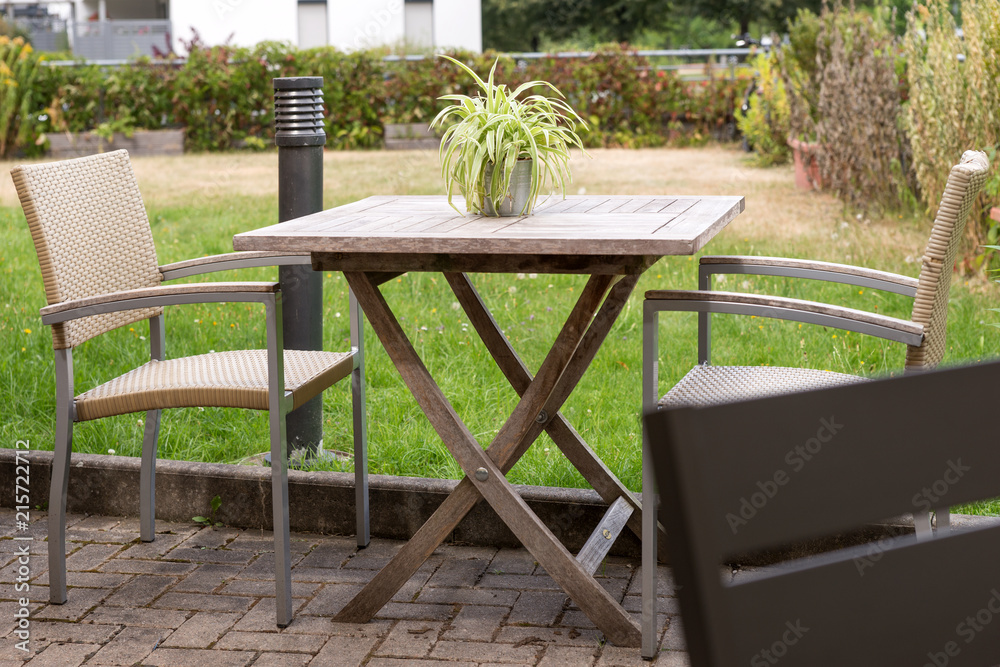 Street cafe is waiting for guests. Empty chairs and table in summer Street cafe is waiting for guests. Empty chairs and table in summer