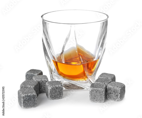 Cuadro en lienzo Glass with liquor and whiskey stones on white background