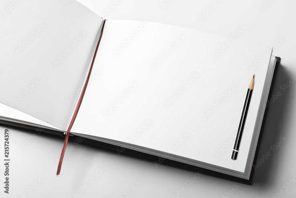 Blank open diary or sketching book with pencil Blank open diary or sketching book with pencil