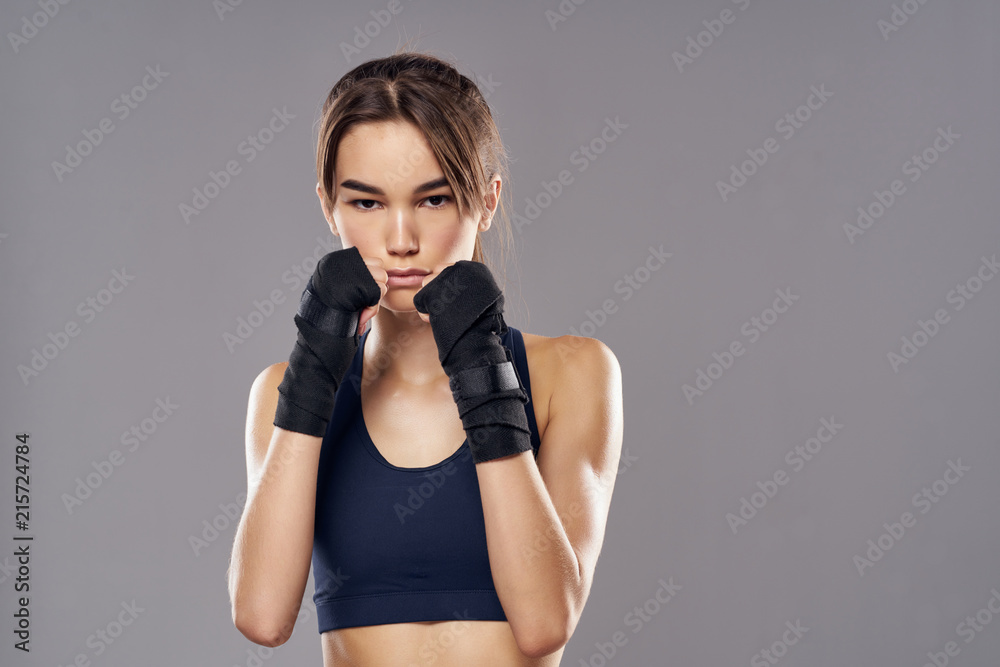 young woman with boxing gloves young woman with boxing gloves