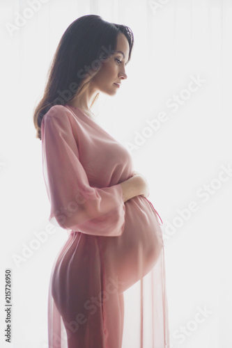 Fototapeta Beautiful pregnant woman