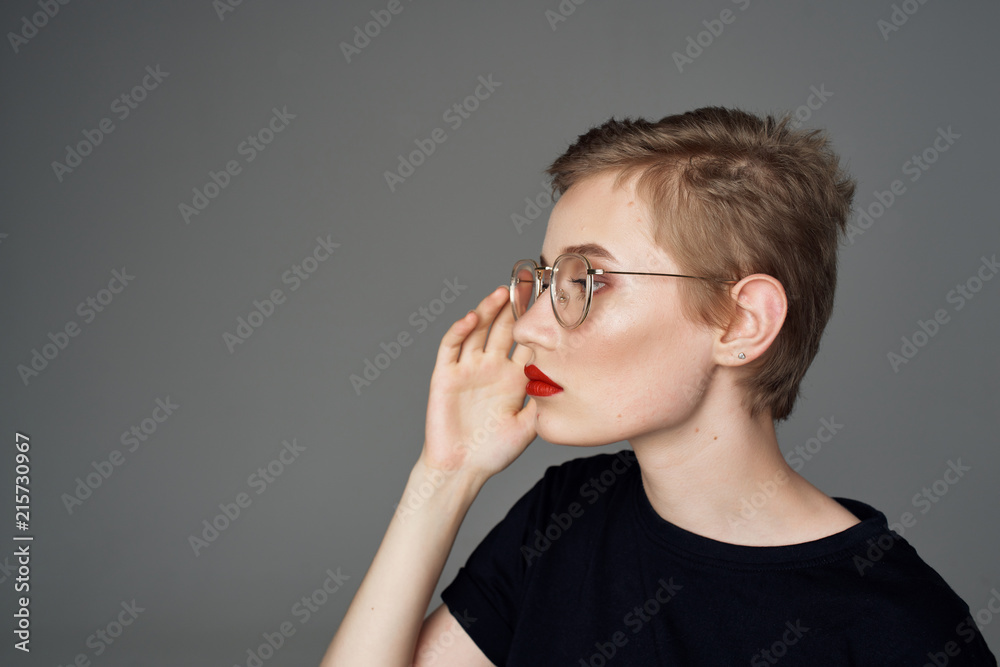 woman with glasses in profile