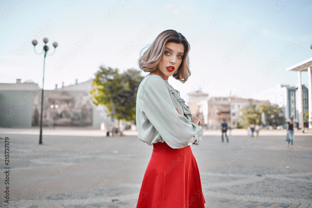 woman in a red skirt