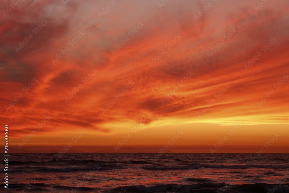 crimson red sunset over the ocean 