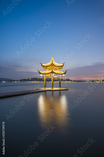 Night scenery of ancient architectural landscape in West Lake, Hangzhou photo