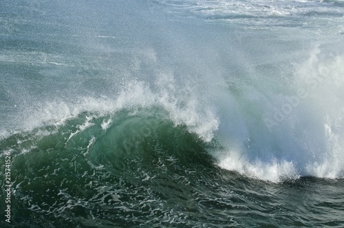 beautiful blue green wave crashing in the ocean 