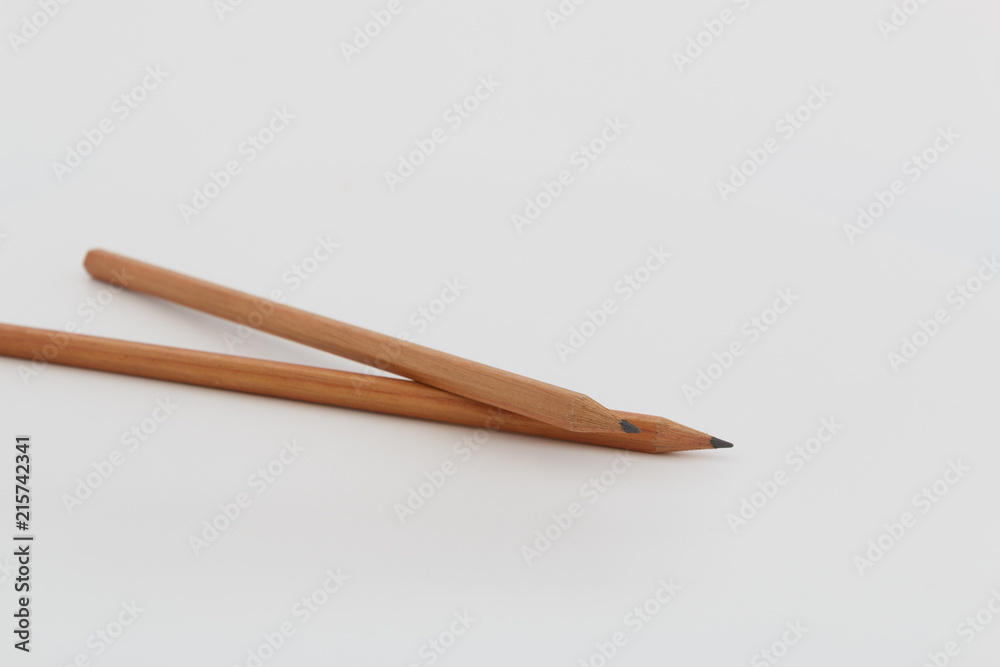 Two Brown pencil with sharp concept ,Isolated on a White Background. Two Brown pencil with sharp concept ,Isolated on a White Background.