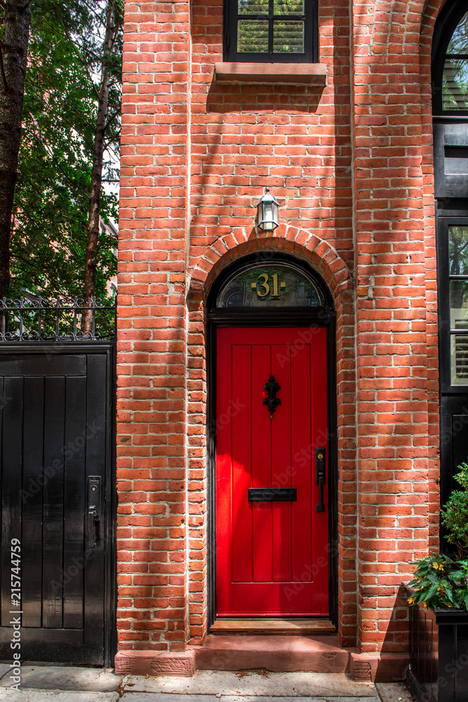 Obraz premium Front door of an ornate brownstone building in an iconic neighborhood of Brooklyn in New York City