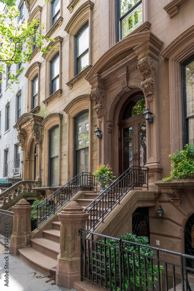 Side view of an ornate brownstone building in an iconic neighborhood of Brooklyn in New York City