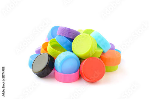 pile of colorful plastic bottle cap on white background