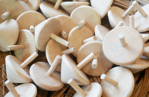 group of wooden spinning toy.