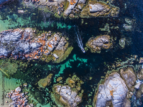 Dinghy and rocky shore