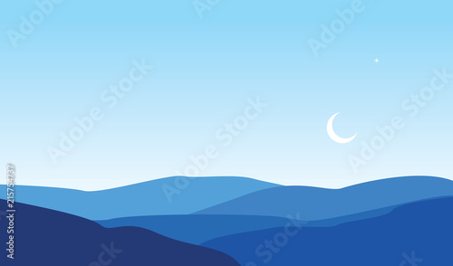 Clear Sky with Crescent Moon Above Desert Landscape