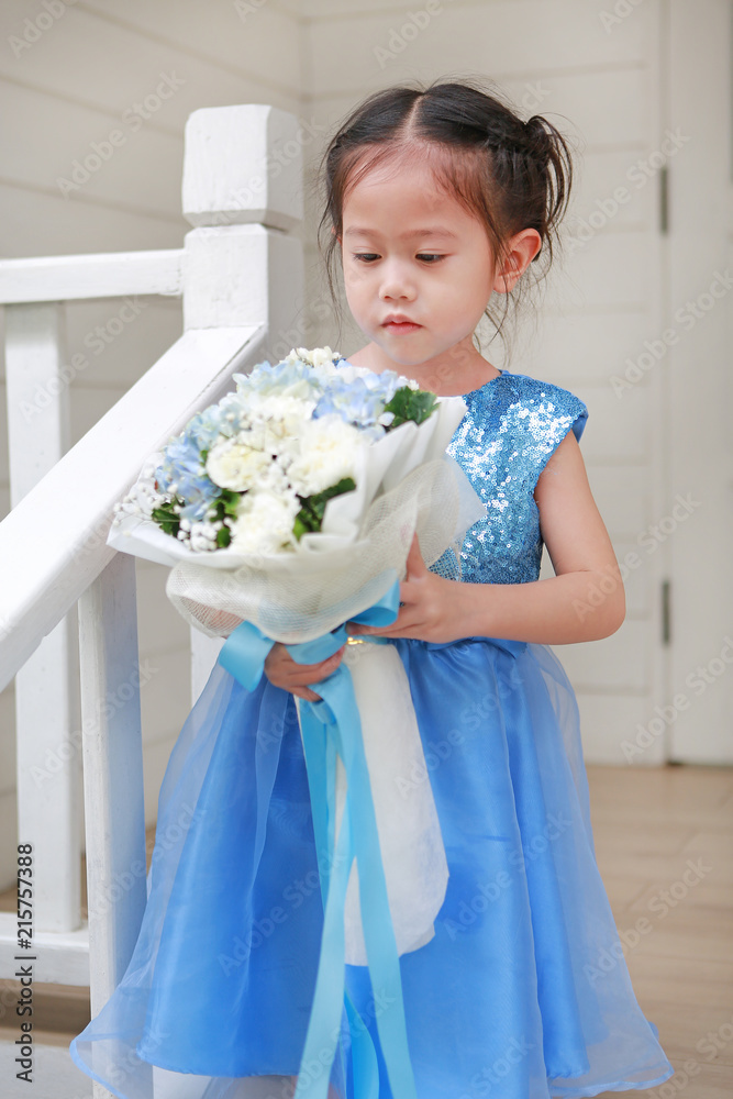 Cute little Asian child girl with Bouquet of flowers. Cute little Asian child girl with Bouquet of flowers.
