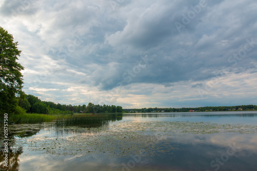 Scenic cloudy sky over lake in rural Lithuania