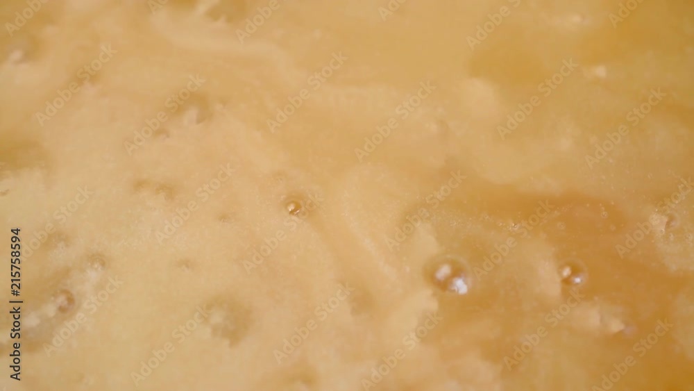 yellow background, liquid honey rotating yellow background, liquid honey rotating