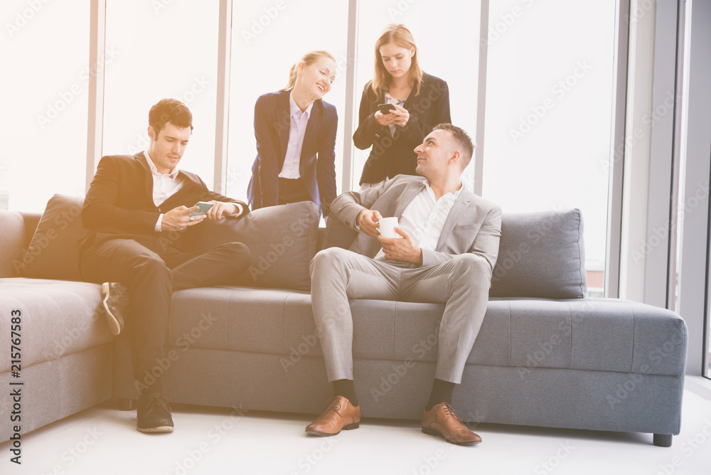 Business people team siting on sofa are talking Business people team siting on sofa are talking